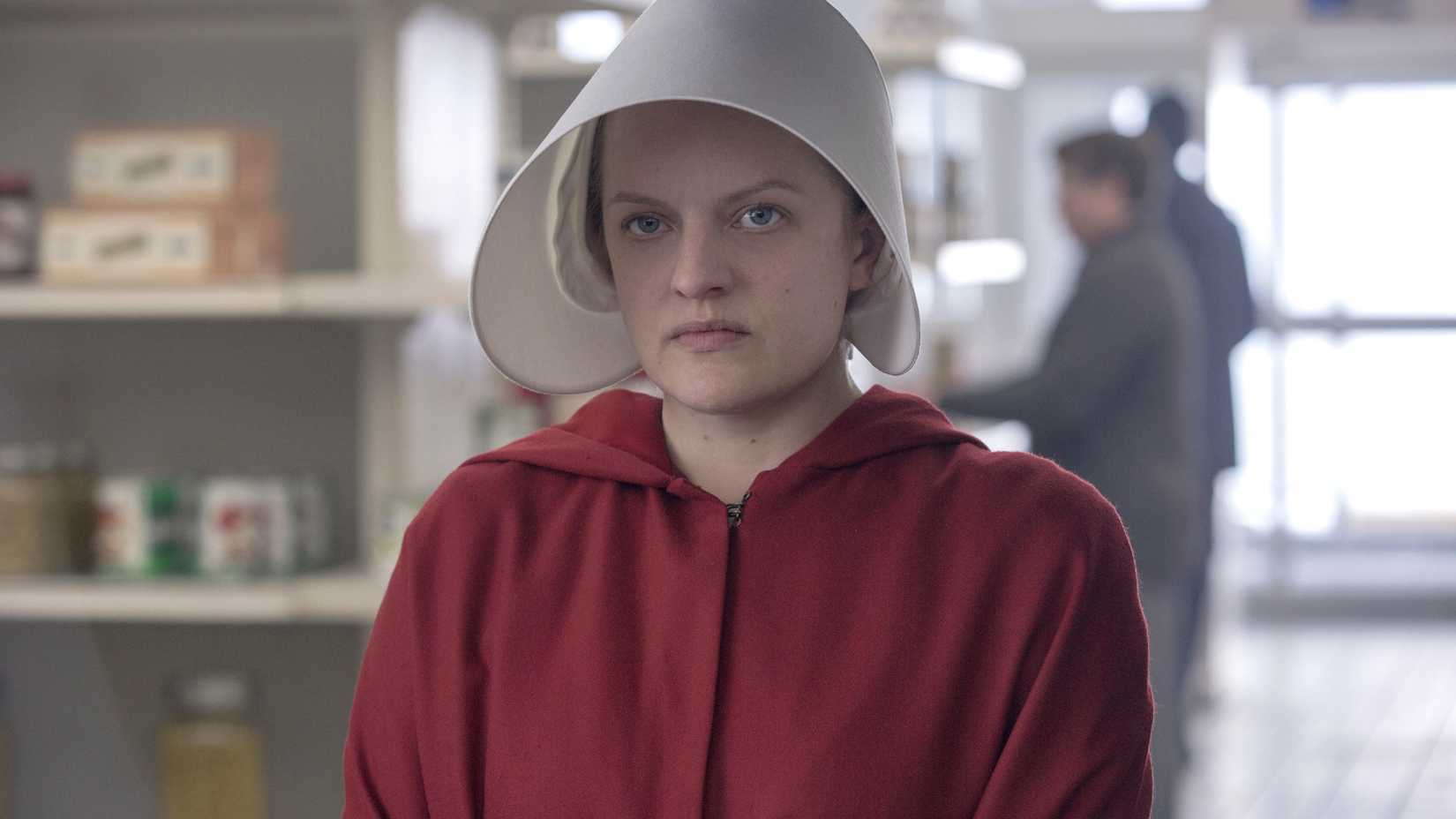 Elisabeth Moss como June